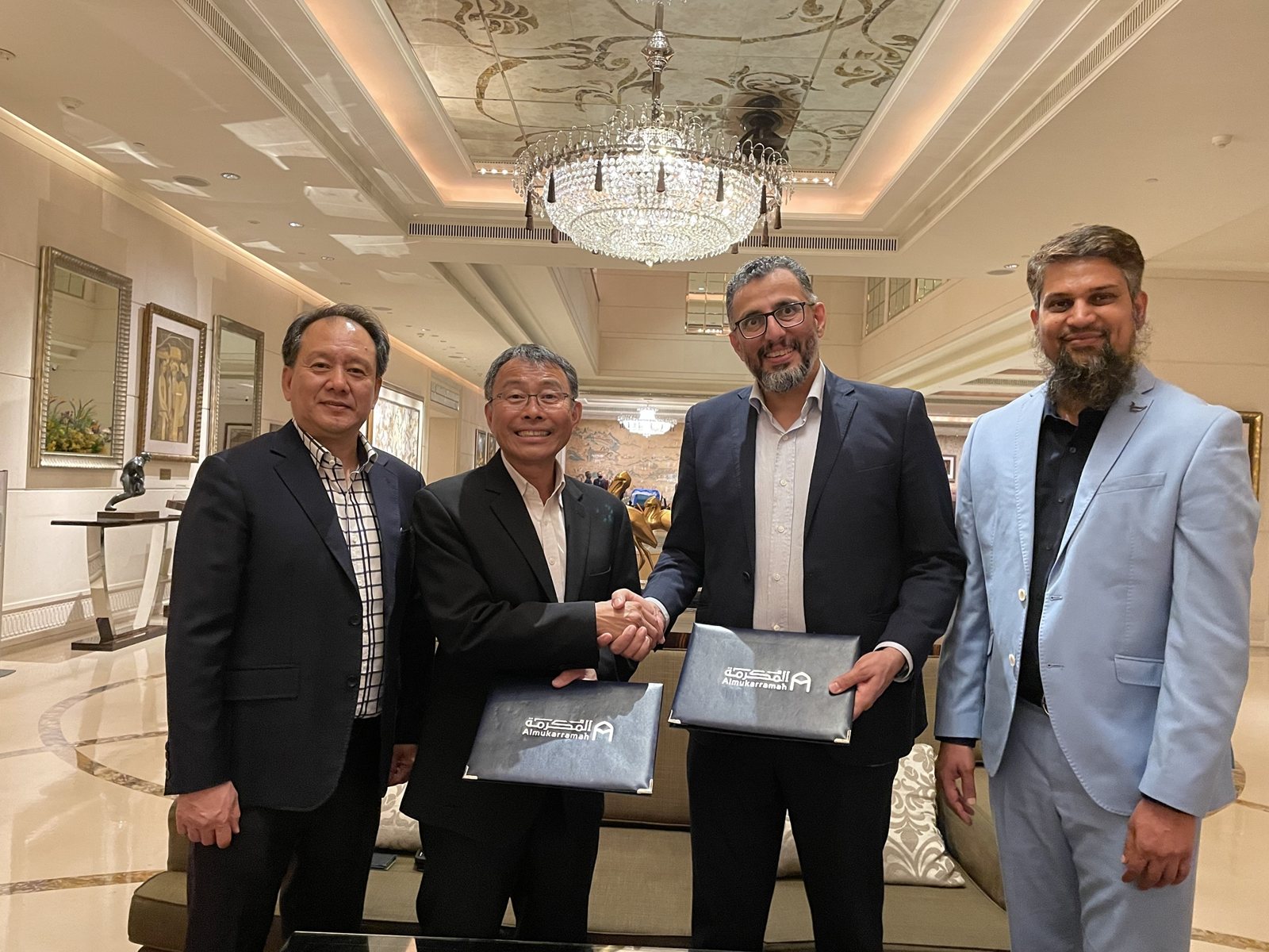 Al Mukarramah agreement signing during the Singapore visit